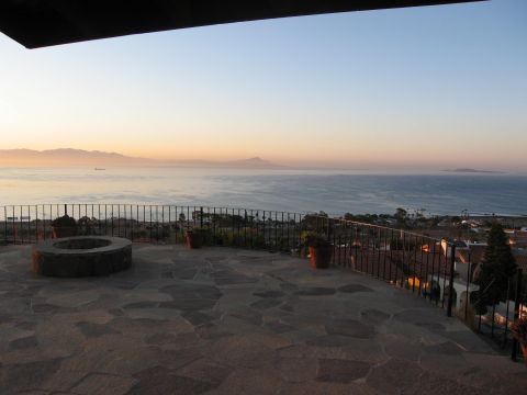 1986 Ford Bronco - Patio overlooks the ocean and distant mountains during a sunset.