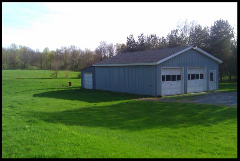 1966 Ford Five Hundred - 5 car outbuilding with 1.5 car lean-to garage, not shown, shed