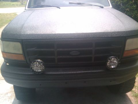 1993 Ford Bronco - The grille and headlights suggest this is a 1992-1996 Ford F-Series truck or Bronco.
