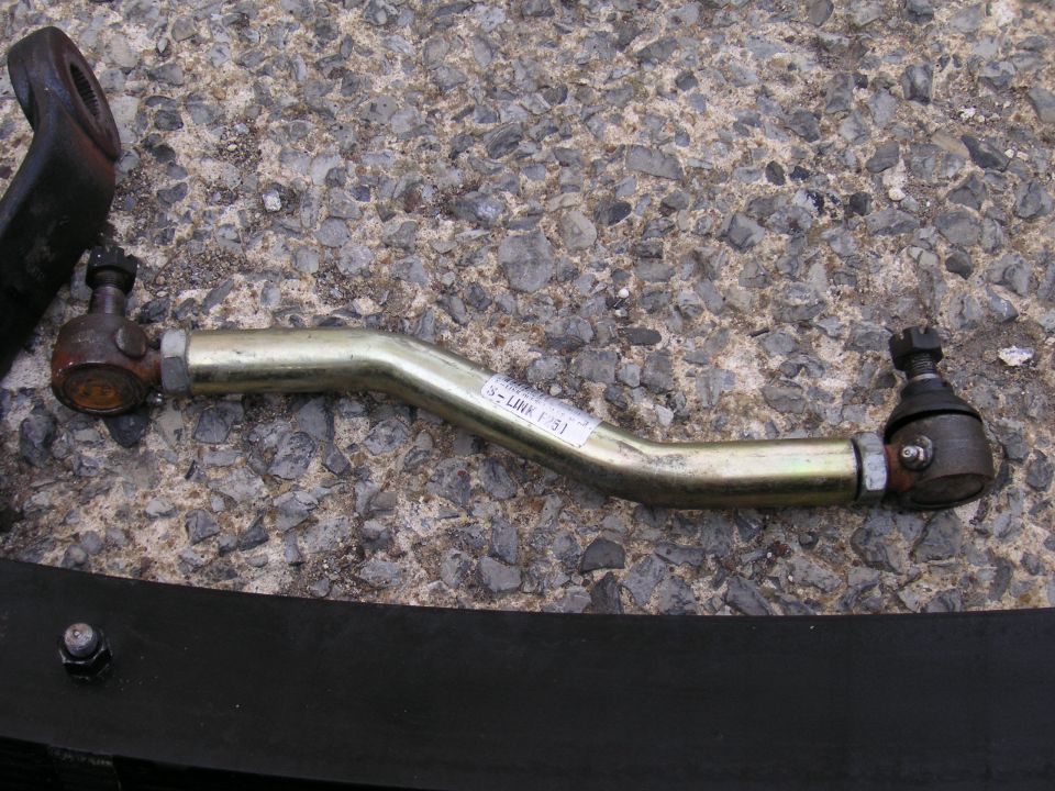 Tie rod assembly with ball joints and a label that reads S-LINK F51