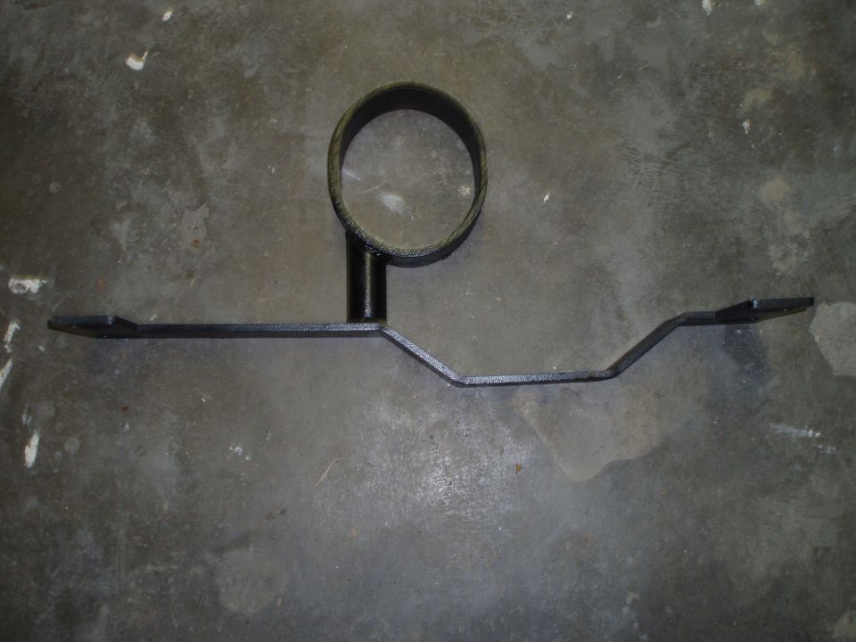 Black metal bracket with a circular opening, likely for a gauge