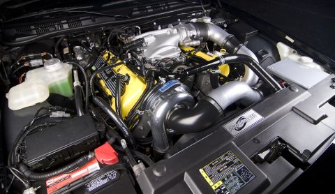 2003 Mercury Marauder - Custom engine bay a ProCharger supercharger system and bright yellow valve covers.