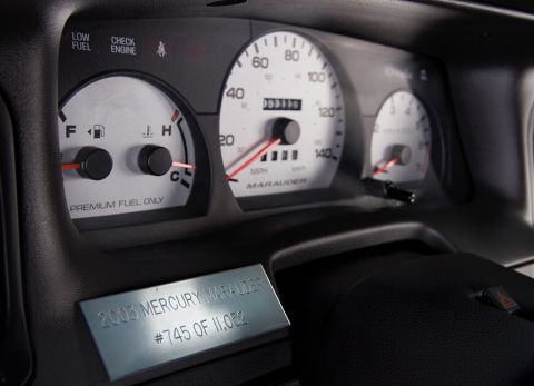 2003 Mercury Marauder - Close-up of the instrument cluster and a commemorative plaque for a 2003 Mercury Marauder.