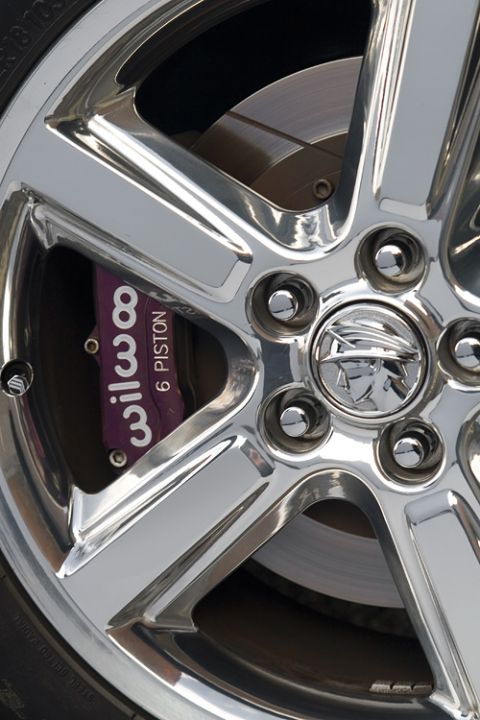 2003 Mercury Marauder - Close-up of a chrome wheel and brake system, showing aftermarket performance parts.