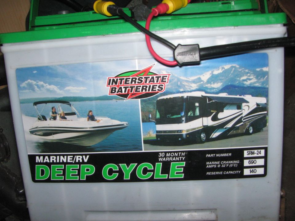 Interstate Batteries Marine/RV Deep Cycle battery with images of a boat and an RV