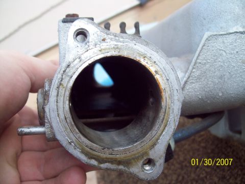 1995 Ford Probe - Close-up of an intake manifold part, with a date stamp of 01/30/2007 visible.