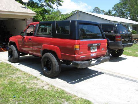 1987 Toyota 4Runner - Red 1987 Toyota 4Runner parked in driveway next to a black SUV.