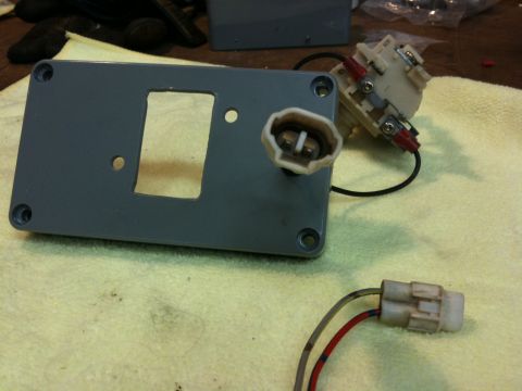 Suzuki Samurai - This photo shows a disassembled electrical component with its associated wiring and mounting bracket.