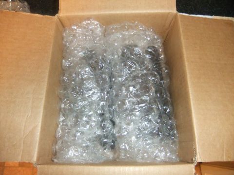 1978 Chevrolet C/K Pickup - Parts are packaged in bubble wrap within a cardboard box for shipping.