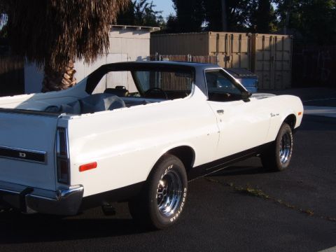 1973 Ford Ranchero - Rear three-quarter view of a white 1973 Ford Ranchero pickup truck with a black top.