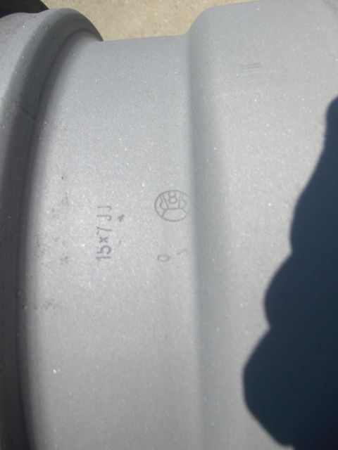 1980 Chevrolet Camaro - A close-up view of a single wheel rim shows its size and manufacturer's markings.
