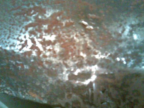 1972 Ford Ranchero - after grinding some, the pitted areas started crumbling through lets not kid ourselves, there's only enough metal left to make a strainer
