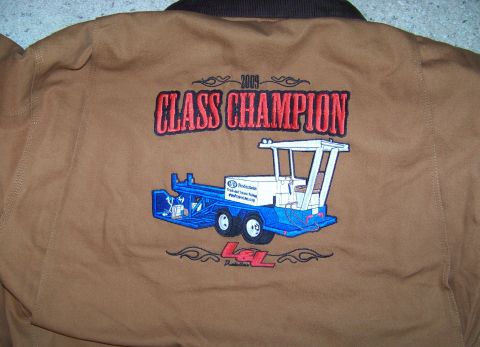 1994 Ford F-150 - This jacket commemorates a 2009 Class Champion with an embroidered graphic of a truck and trailer.