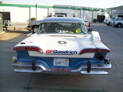 1990 Ford Bronco - Rear view of a blue and white number 6 race car bearing a BFGoodrich decal and a California license plate reading 3DAP770.
