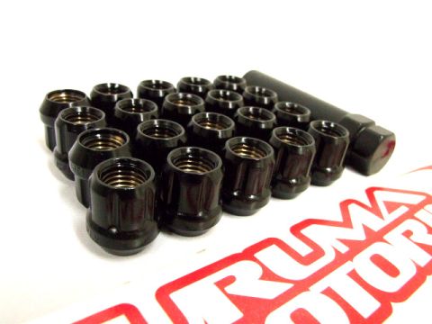 1995 Ford Probe - A set of black lug nuts and a lug wrench are displayed on a surface with prominent branding.