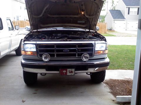 1992 Ford Bronco - The grille and headlight design suggest this is a mid-1990s Ford F-Series truck.