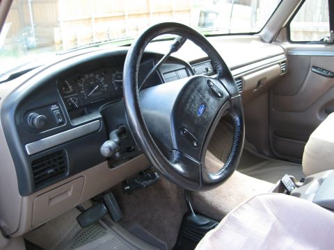 1993 Ford Bronco interior with dashboard and steering wheel