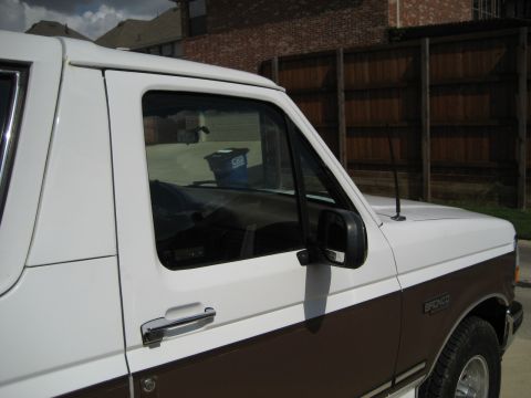 1993 Ford Bronco - This 1993 Ford Bronco shows its two-tone paint scheme and side profile.
