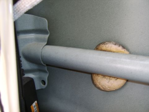 1996 Mercury Grand Marquis - A close-up of the door beam pictured and labeled above. The small black part in the bottom left is the lock actuator.
