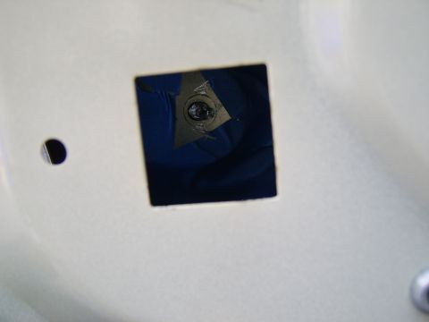 1996 Mercury Grand Marquis - The bottom rivet on the other side removed. As mentioned in an earlier pic, this hole is where the window motor wiring passes through and i…