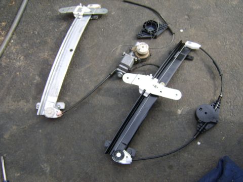 1996 Mercury Grand Marquis - Old and new. The new regulator is an aftermarket Dorman part. Not my first choice, and I'd advise you use OEM/Ford - though it seems just f…