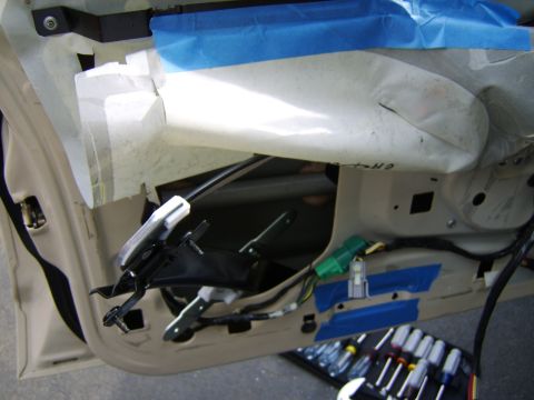 1996 Mercury Grand Marquis - Snaking the new window regulator in. The replacement was secured using 1/4" hardware (bolts, washers, locknuts) rather than rivets. DO…
