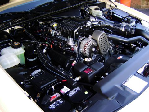 1996 Mercury Grand Marquis - Detailed view of a car's engine bay, showing various components and wiring.