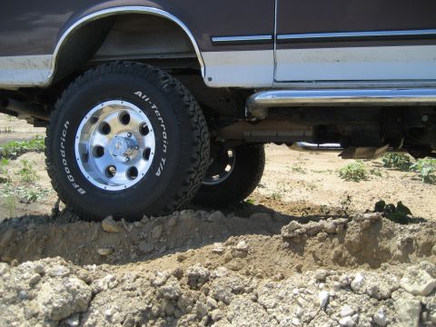1993 Ford Bronco - This lifted truck features BFGoodrich All-Terrain tires, suggesting off-road capability.