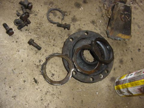 1992 Ford Bronco - remove both lock rings and lock tap, pull off hub.