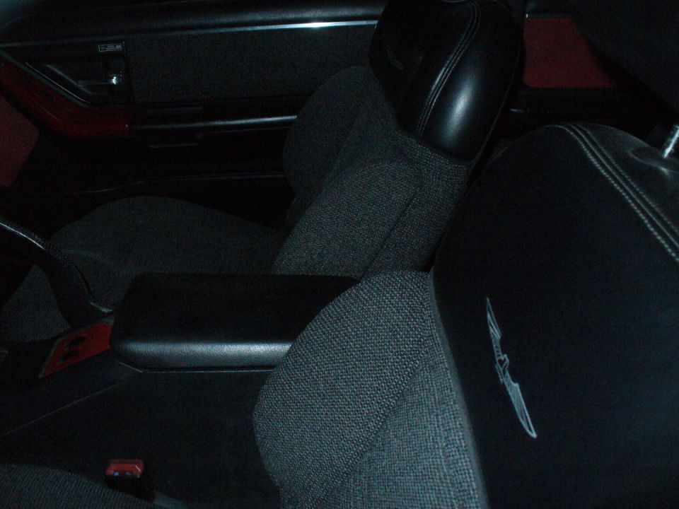 Interior of a 1995 Ford Thunderbird showing front seats and door panel
