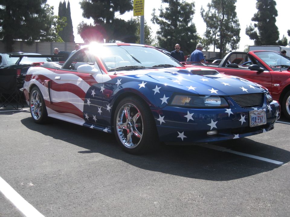Convertible with American flag paint scheme, 3q front view