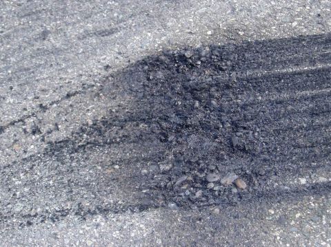 1988 Ford Bronco - chewed up blacktop