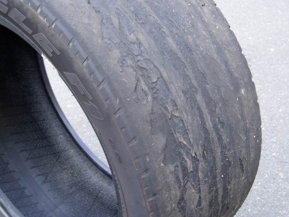 Tire with severe tread wear and damage