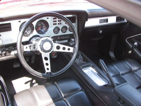 1996 Ford C-350 (Centurion Conversions) - Interior view of a vehicle's dashboard, steering wheel, and seats.