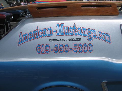 1996 Ford C-350 (Centurion Conversions) - Van with "American-Mustangs.com" and phone number 619-390-5300, a wooden roof rack.