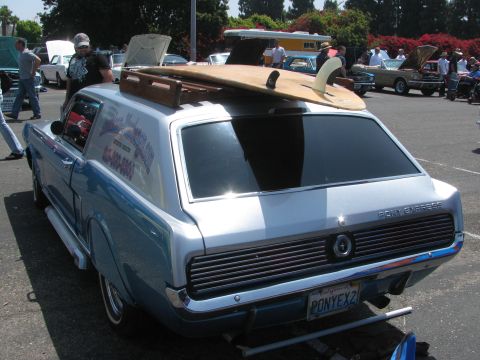 1996 Ford C-350 (Centurion Conversions) - Custom 1967 Ford Mustang Station Wagon, also known as a "Mustang Wagon", with a surfboard on its roof.
