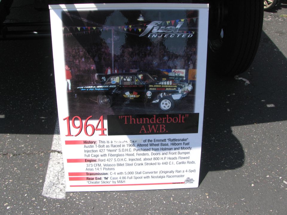 1964 Ford Thunderbolt A.W.B. drag car, black with red and white lettering, side view