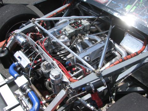 1996 Ford C-350 (Centurion Conversions) - Customized Ford V8 engine with chrome accents and performance parts visible.