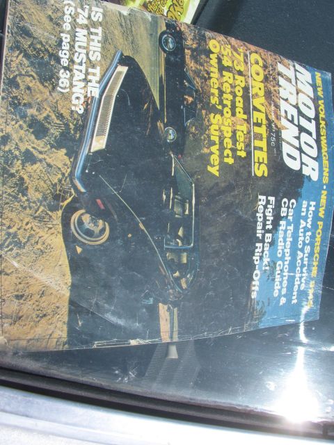 1996 Ford C-350 (Centurion Conversions) - Motor Trend magazine cover from the 1970s Corvettes and a Mustang article.