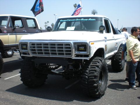 1979 Ford Bronco - Modified 1979 Ford F-Series pickup truck with off-road tires and 'Azusa Canyon Off Road Assn' sticker.