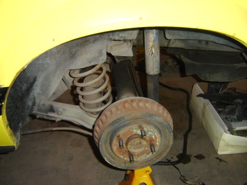 1979 Ford Mustang - this is the before photo of the factory junk on driver rear. doing a brake swap