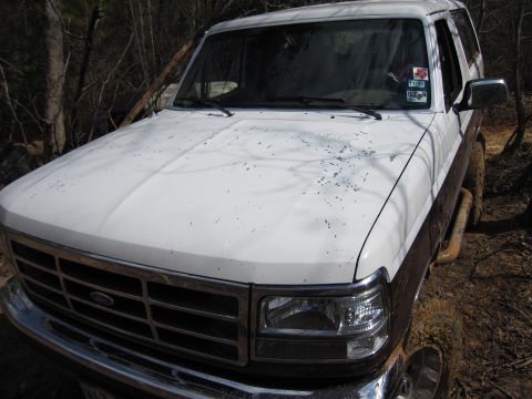 1993 Ford Bronco - This 1993 Ford Bronco, seen from a 3q-front angle, has a visible windshield sticker.