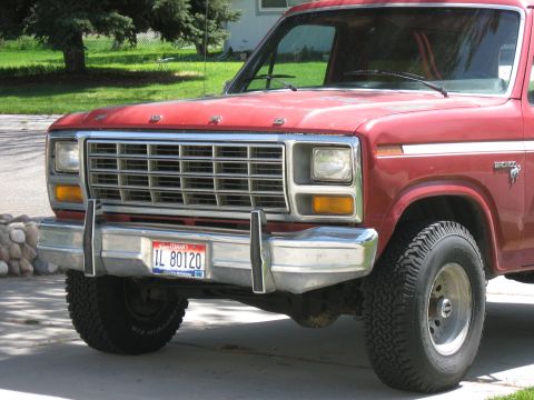 1981 Ford Bronco - Front view of a red 1981 Ford Bronco, a prominent chrome grille and an Illinois license plate.