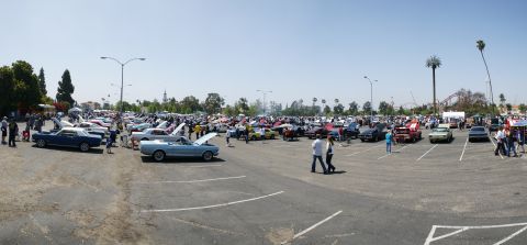 1992 Ford Taurus - A large gathering of classic automobiles displayed at an outdoor event.