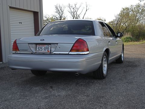 2000 Ford Crown Victoria - Rear view of a silver Ford Crown Victoria with a Wisconsin license plate.