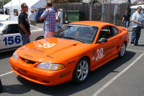 1992 Ford Taurus - This orange 1995 Ford Mustang, number 39, is ready for the track with racing decals and sponsor logos.