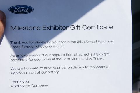 1992 Ford Taurus - This gift certificate acknowledges participation in a Ford car exhibit and offers a discount for merchandise.
