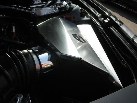 2004 Ford Crown Victoria - Close-up view of a modified engine bay with custom chrome and polished metal components.