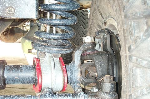 1995 Ford Bronco - Camber adjusting torque sleeves that the balljoint goes through.