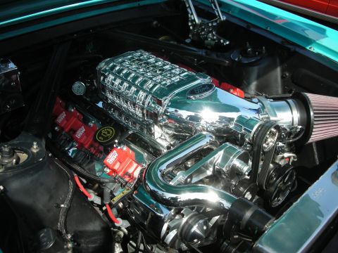 2004 Ford Crown Victoria - Engine bay details with a supercharged Ford V8 and custom ignition system.